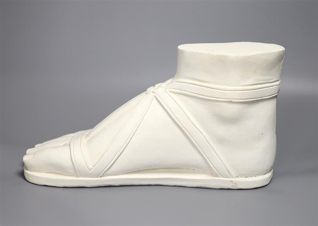 A cast plaster model of a gladiators foot, length 37cm